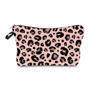 Leopard cosmetic bag with soft pink background, for makeup and travel.